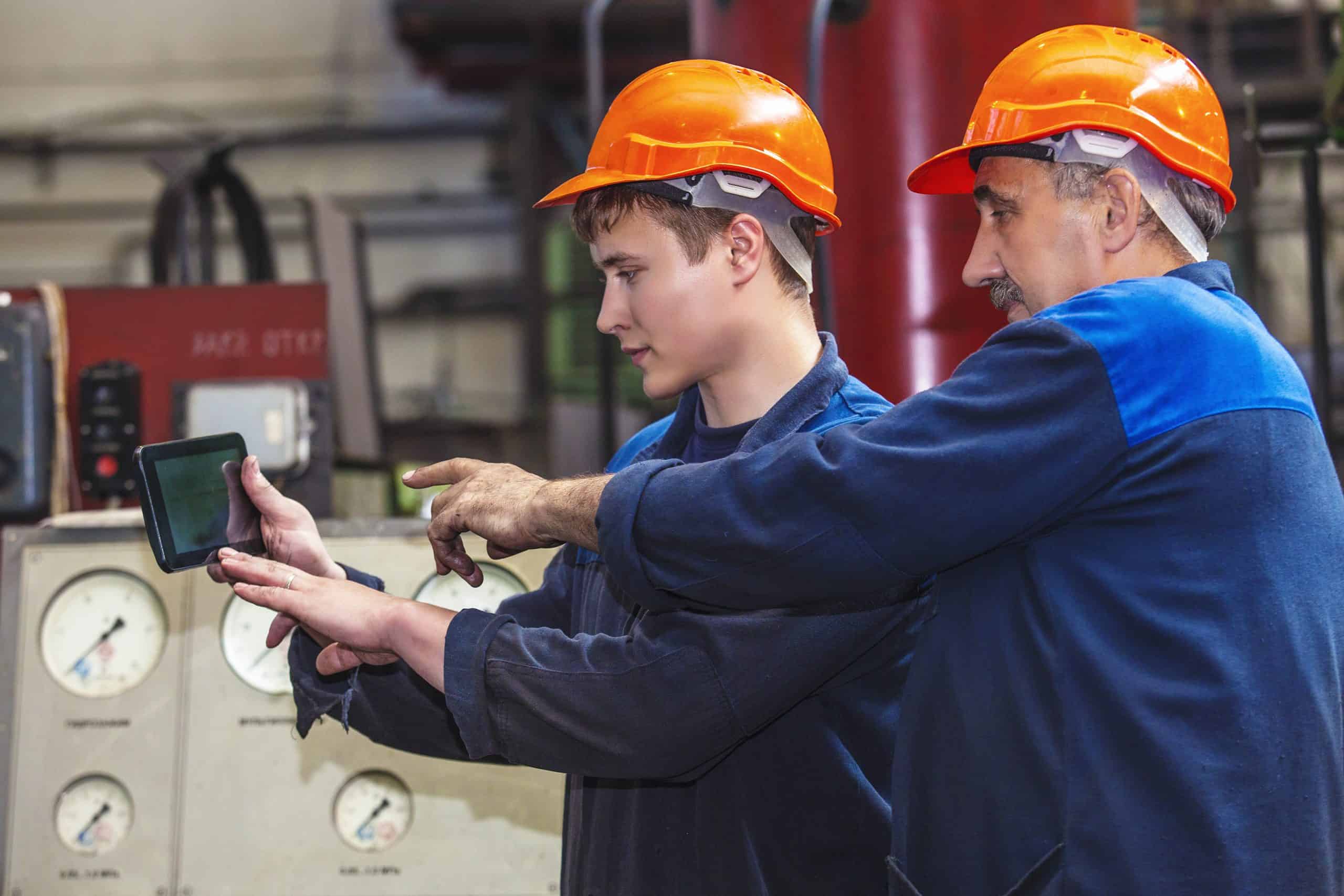 Manufacturing workers talking